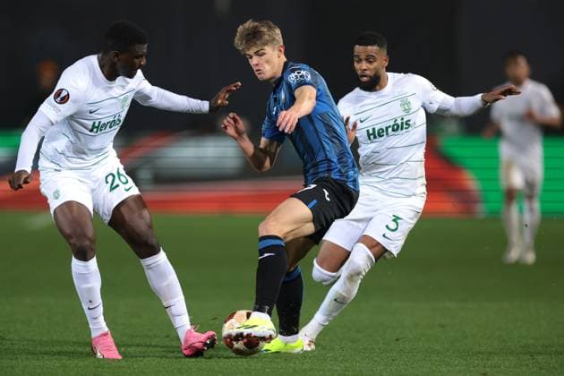 Bergamo, Italy, 14th March 2024. Charles De Ketelaere of Atalanta defends the ball from Ousmane Diomande and Jeremiah St. Juste of Sporting CP during the UEFA Europa League match at Stadio di Bergamo. Picture credit should read: Jonathan Moscrop Sportimage EDITORIAL USE ONLY. No use with unauthorised audio, video, data, fixture lists, club league logos or live services. Online in-match use limited to 120 images, no video emulation. No use in betting, games or single club league player publications. SPI-2992-0055
