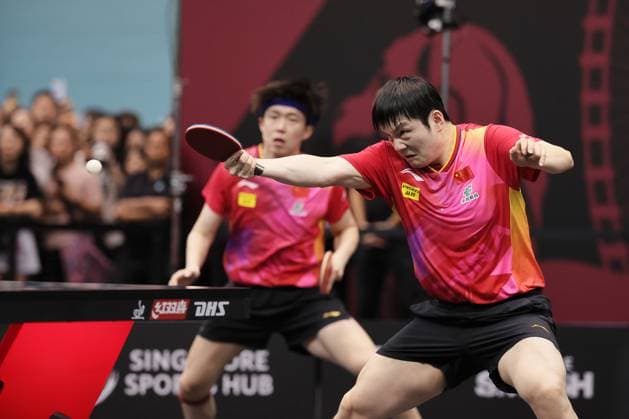 Sport Themen der Woche KW11 SINGAPORE, SINGAPORE - MARCH 15: Fan Zhendong and Wang Chuqin of China compete in the Men s Doubles Semifinal match against Mattias Falck and Anton Kallberg of Sweden on day five of the WTT Singapore Smash 2024 at Singapore Sports Hub on March 15, 2024 in Singapore.  Copyright: xVCGx 111485703687