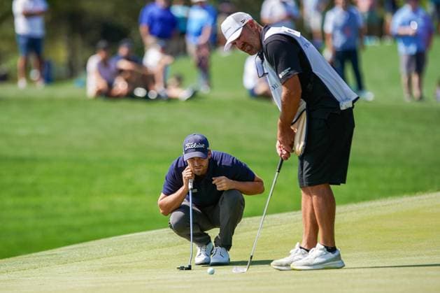 March 15, 2024, Ponte Vedra Beach, Florida, United States: WYNDHAM CLARK (USA) (L) and his caddie JOHN ELLIS line up a putt on the 3rd green during the second round of the 2024 PLAYERS Championship at TPC Sawgrass. Ponte Vedra Beach United States - ZUMAw109 20240315_fap_w109_001 Copyright: xDebbyxWongx