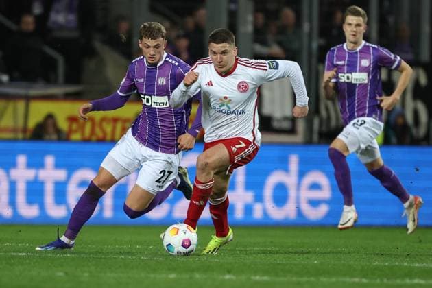 Sport Themen der Woche KW11 Sport Bilder des Tages 2. Bundesliga - VfL Osnabrück - Fortuna Düsseldorf am 15.03.2024 an der Bremer Brücke in Osnabrück MickaÃ«l Michael Cuisance (Osnabrueck 27) gegen Christos Tzolis (Duesseldorf 7) *** 2 Bundesliga VfL Osnabrück Fortuna Düsseldorf on 15 03 2024 at Bremer Brücke in Osnabrück Mickaël Michael Cuisance Osnabrueck 27 vs Christos Tzolis Duesseldorf 7 MH