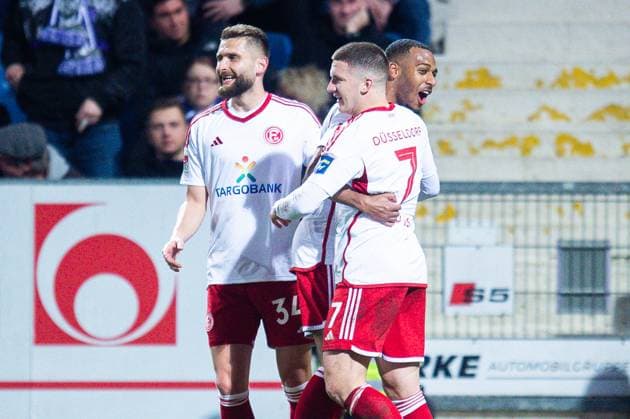 15.03.2024 - Fußball, 2023 2024, 2. Bundesliga, 26. Spieltag, VfL Osnabrück - Fortuna Düsseldorf: (M) Christos Tzolis (Düsseldorf) jubelt nach seinem Tor zum 0:1 mit (L) Nicolas Gavory (Düsseldorf), (R) Marlon Mustapha (Düsseldorf) DFL REGULATIONS PROHIBIT ANY USE OF PHOTOGRAPHS AS IMAGE SEQUENCES AND OR QUASI-VIDEO.