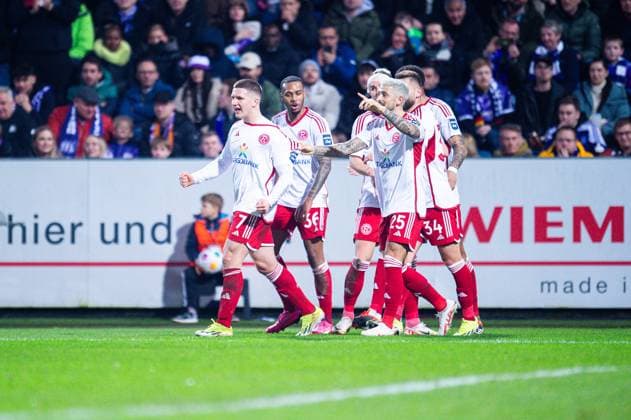 15.03.2024 - Fußball, 2023 2024, 2. Bundesliga, 26. Spieltag, VfL Osnabrück - Fortuna Düsseldorf: (L) Christos Tzolis (Düsseldorf) jubelt nach seinem Tor zum 0:1 mit Marlon Mustapha (Düsseldorf), Matthias Zimmermann (Düsseldorf) DFL REGULATIONS PROHIBIT ANY USE OF PHOTOGRAPHS AS IMAGE SEQUENCES AND OR QUASI-VIDEO.