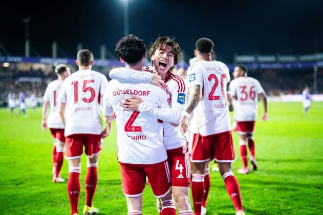 15.03.2024 - Fußball, 2023 2024, 2. Bundesliga, 26. Spieltag, VfL Osnabrück - Fortuna Düsseldorf: (L-R) Takashi Uchino (Düsseldorf) jubelt nach seinem Tor zum 0:2 mit Ao Tanaka (Düsseldorf) DFL REGULATIONS PROHIBIT ANY USE OF PHOTOGRAPHS AS IMAGE SEQUENCES AND OR QUASI-VIDEO.