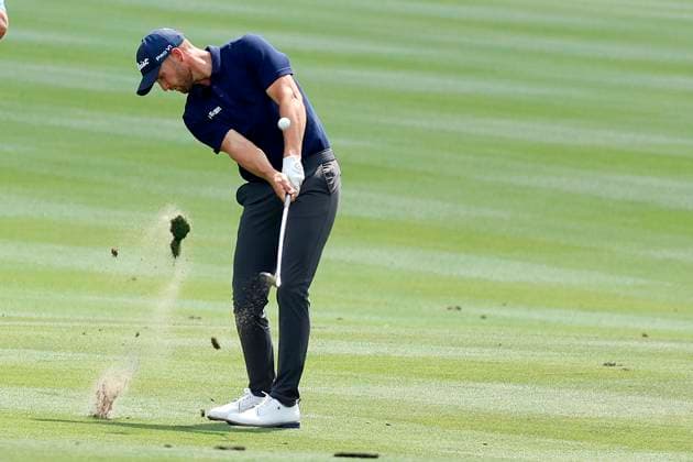 PONTE VEDRA BEACH, FL - MARCH 15: PGA, Golf Herren golfer Wyndham Clark hits an approach shot from the fairway on the 9th hole during The Players Championship on March 15, 2024, at TPC Sawgrass in Ponte Vedra Beach, Florida. (Photo by Brian Spurlock Icon Sportswire) GOLF: MAR 15 PGA THE PLAYERS Championship EDITORIAL USE ONLY Icon2403156