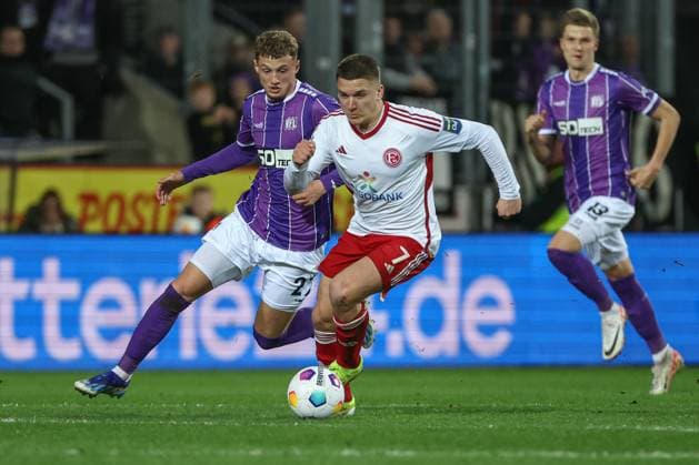 2. Bundesliga - VfL Osnabrück - Fortuna Düsseldorf am 15.03.2024 an der Bremer Brücke in Osnabrück MickaÃ«l Michael Cuisance (Osnabrueck 27) gegen Christos Tzolis (Duesseldorf 7)