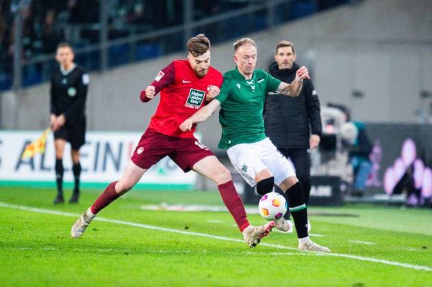 16.03.2024 - Fußball, 2023 2024, 1. Bundesliga, 26. Spieltag, Hannover 96 - 1. FC Kaiserslautern: (L-R) Julian Niehues (Kaiserslautern), Havard Nielsen (Hannover) DFL REGULATIONS PROHIBIT ANY USE OF PHOTOGRAPHS AS IMAGE SEQUENCES AND OR QUASI-VIDEO.