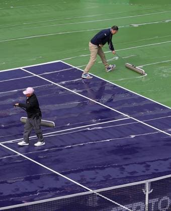 Staff and umpire Mohamed Lahyani help squeegee the rain off the court BNP Paribas Open, Tennis, Day 11, Indian Wells Tennis Garden, California, USA - 16 Mar 2024  Copyright: xEllaxLing Shutterstockx 14386187af