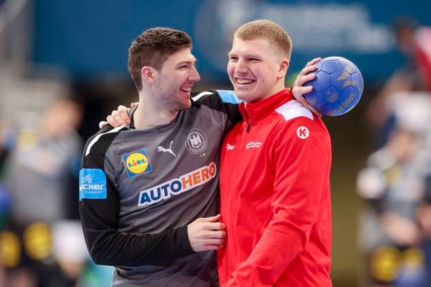 Lukas Zerbe (Germany) und Lukas Hutecek (Austria) lachen, Handball - 2024 IHF Men s Olympic Qualification Tournament, Austria vs Germany, ZAG-Arena, 17.03.2024, Hannover, Deutschland.