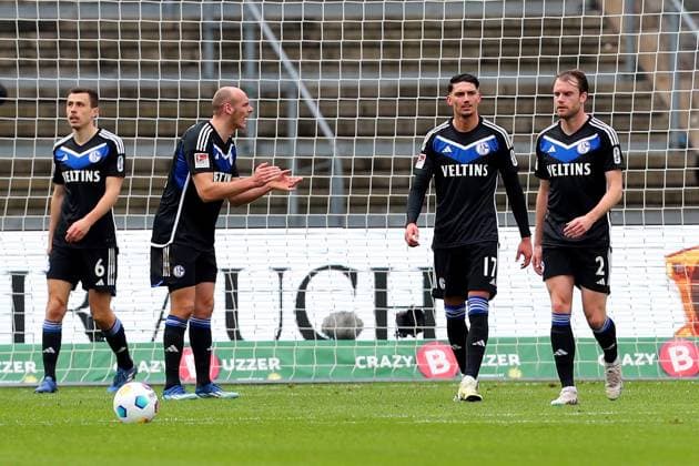 17.03.2024, xtgx, Fussball 2.Bundesliga, Hertha BSC Berlin - FC Schalke 04 emspor, v.l. Ron Schallenberg (FC Schalke 04) Henning Matriciani (FC Schalke 04) Yusuf Kabadayi (FC Schalke 04) Thomas Ouwejan (FC Schalke 04) Enttäuscht enttaeuscht traurig frustriert ratlos (DFL DFB REGULATIONS PROHIBIT ANY USE OF PHOTOGRAPHS as IMAGE SEQUENCES and or QUASI-VIDEO) Berlin