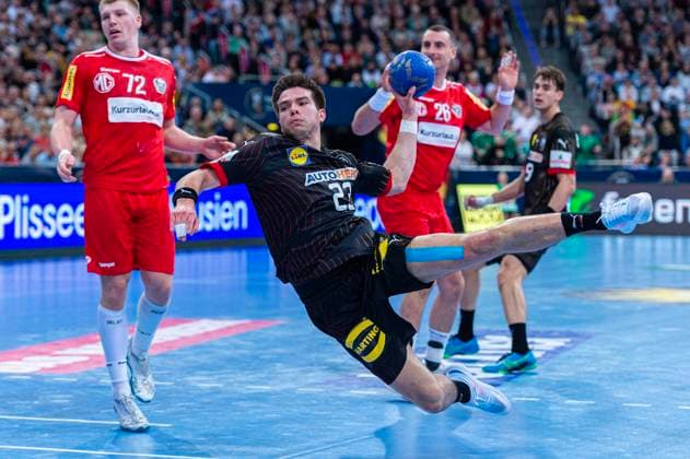 Renars Uscins (Germany , Nr. 23) (L-R), Germany (black) against Austria (red) (3. Matchday of the 2024 IHF s Olympic Qualification Tournament) (17.03.2024, ZAG Arena (Hannover, GER), Copyright: xJanxGuentherx xTSVxHannover-Burgdorfx