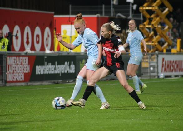 18.03.2024, xgrfx, Fussball 1.Bundesliga Damen, Bayer Leverkusen - 1.FC Köln emspor, v.l. Laura Vogt (1.FC Köln), Elisa Senß (Bayer Leverkusen) (DFL DFB REGULATIONS PROHIBIT ANY USE OF PHOTOGRAPHS as IMAGE SEQUENCES and or QUASI-VIDEO) Leverkusen