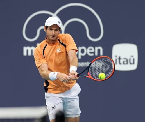 March 22, 2024, Miami Gardens, Florida, United States Of America: MIAMI GARDENS, FLORIDA - MARCH 22: Andy Murray of the United Kingdom hits a shot against TomoÂ¡s MartoÂ­n Etcheverry of Argentina during their match on day 7 of the Miami Open at Hard Rock Stadium on March 22, 2024 in Miami Gardens, Florida....People: Andy Murray Miami Gardens United States Of America - ZUMAs214 20240322_ada_s214_097 Copyright: xSMGx
