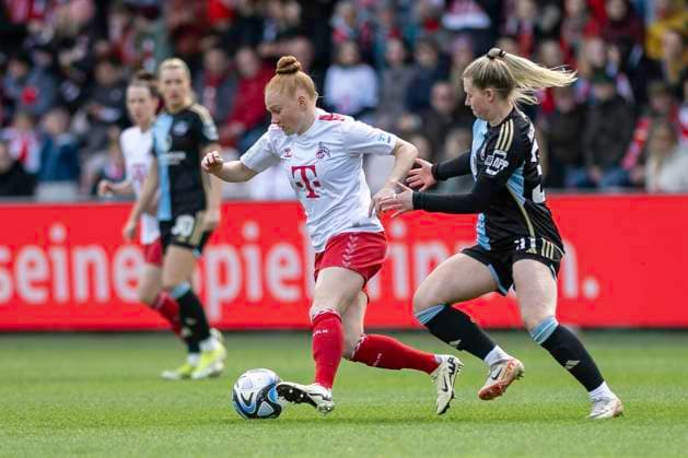 Zweikampf zwischen Laura Vogt (1. FC Köln, 08) und Selma Magnusdottir (1. FC Nuernberg, 37), rechts. Fussball: Google Pixel Frauen-Bundesliga, Saison 2023 2024, 16. Spieltag, 1. FC Koeln - 1. FC Nuernberg am 23.03.2024 im Franz-Kremer-Stadion in Koeln. Wichtiger Hinweis: Gemaess den Vorgaben der DFL Deutsche Fussball Liga bzw. des DFB Deutscher Fussball-Bund ist es untersagt, in dem Stadion und oder vom Spiel angefertigte Fotoaufnahmen in Form von Sequenzbildern und oder videoaehnlichen Fotostrecken zu verwerten bzw. verwerten zu lassen. Foto: Kirchner-Media TH Copyright: xKirchner-Media THx