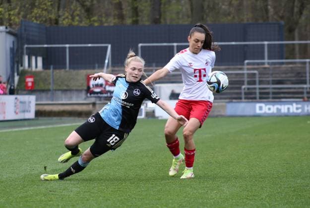 23.03.2024, xgrfx, Fussball 1.Bundesliga Damen, 1.FC Köln Frauen - 1.FC Nürnberg emspor, v.l. Franziska Mai (1.FC Nürnberg), Natalia Padilla-Bidas (1.FC Köln) (DFL DFB REGULATIONS PROHIBIT ANY USE OF PHOTOGRAPHS as IMAGE SEQUENCES and or QUASI-VIDEO) Köln