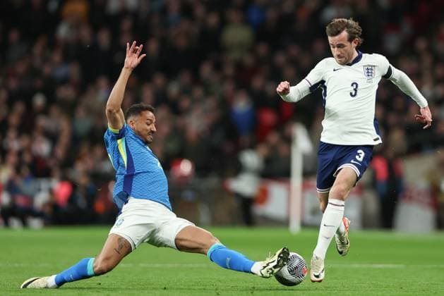 Ben Chilwell of England side tackled by Danilo (Cap.) of Brasil England v Brazil, International Football Friendly, Wembley Stadium, Wembley, London, UK - 23 03 2024 Editorial use only  Copyright: xMattxImpey Shutterstockx 14399525e
