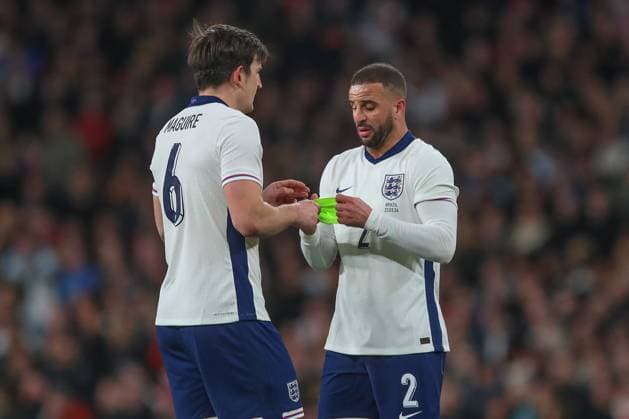 International Friendly, Länderspiel, Nationalmannschaft England v Brazil Kyle Walker of England gives the captains armband to Harry Maguire of England during the International Friendly match England vs Brazil at Wembley Stadium, London, United Kingdom, 23rd March 2024 (Photo by Gareth Evans News Images) London Wembley Stadium Greater London United Kingdom Copyright: xGarethxEvans NewsxImagesx
