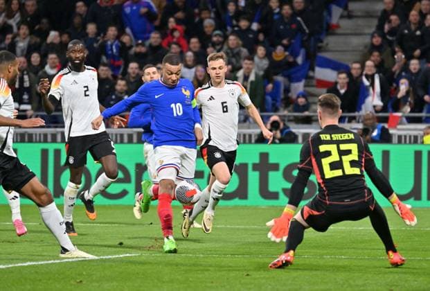 Kylian MbappÃ (france) vs Marc-Andre Ter Stegen (allemagne) FOOTBALL: France vs Allemagne - Amical - 23 03 2024 FredericChambert Panoramic 