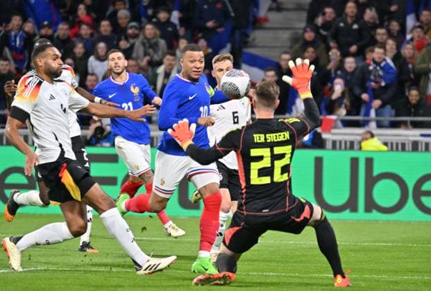 Kylian MbappÃ (france) vs Marc-Andre Ter Stegen (allemagne) FOOTBALL: France vs Allemagne - Amical - 23 03 2024 FredericChambert Panoramic 