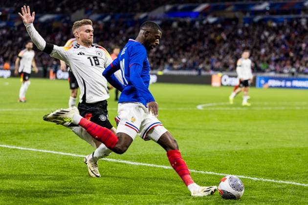 UEFA Freundschaftsspiel: Frankreich - Deutschland; 23.03.2024 Zweikampf Maximilian Mittelstädt (Deutschland, 18), Ousmane Dembele (Frankreich, 11) UEFA Freundschaftsspiel: Frankreich - Deutschland, Lyon, Groupama Stadium am 23.03.2024 Copyright: xBEAUTIFULxSPORTS Wunderlx