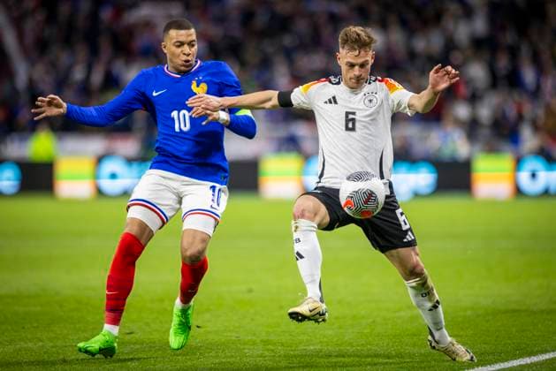 Lyon, France. 23rd Mar 2024. Joshua Kimmich (Deutschland), Kylian Mbappe (FRA) Frankreich - Deutschland France - Germany 23.03.2024