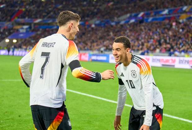 Kai Havertz, DFB 7 scores, shoots goal , Tor, Treffer, Torschuss, 2-0 , celebrates his goal, happy, laugh, celebration, with Jamal MUSIALA, dfb 10 in the friendly match FRANCE - GERMANY FRANKREICH - DEUTSCHLAND in preparation for European Championships 2024 on Mar 23, 2024 in Lyon, France.