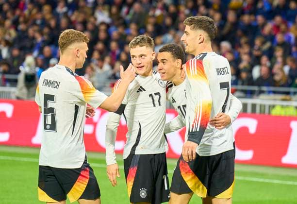 Kai Havertz, DFB 7 scores, shoots goal , Tor, Treffer, Torschuss, 2-0 , celebrates his goal, happy, laugh, celebration, with Jamal MUSIALA, dfb 10 Florian Wirtz, Nr. 17 DFB Joshua Kimmich, DFB 6 in the friendly match FRANCE - GERMANY FRANKREICH - DEUTSCHLAND in preparation for European Championships 2024 on Mar 23, 2024 in Lyon, France.