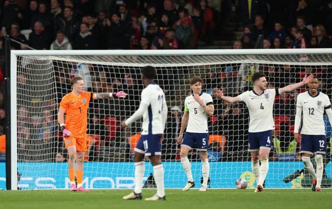Jordan Pickford (E) John Stones (E) Declan Rice (E) and Ezri Konsa (E) dejection after the Brazil goal (0-1) at the England v Brazil international match, Länderspiel, Nationalmannschaft at Wembley Stadium, London, UK on 23rd March, 2024. 