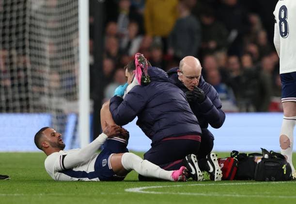 Kyle Walker (E) receives treatment at the England v Brazil international match, Länderspiel, Nationalmannschaft at Wembley Stadium, London, UK on 23rd March, 2024. 