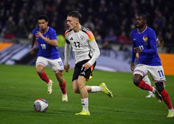 23.03.2024, Fussball Nationalteams Freundschaftsspiele 2024, Frankreich - Deutschland, im Groupama Stadium (Lyon, Frankreich). Florian Wirtz (Deutschland) am Ball