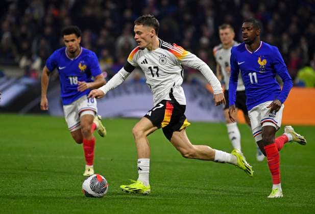 23.03.2024, Fussball Nationalteams Freundschaftsspiele 2024, Frankreich - Deutschland, im Groupama Stadium (Lyon, Frankreich). Florian Wirtz (Deutschland) am Ball