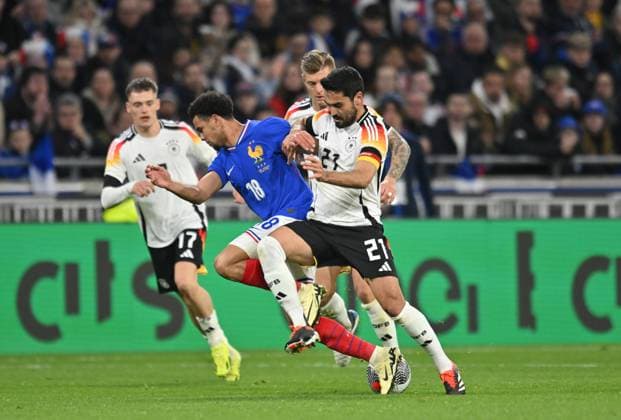 Warren Zaire-Emery (france) vs Ikai Gubndogan (allemagne) FOOTBALL: France vs Allemagne - Amical - 23 03 2024 FredericChambert Panoramic 