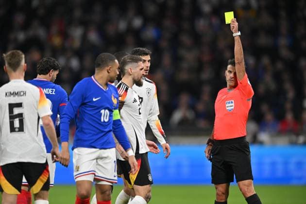Kylian MbappÃ (france) et Jesus Gil Manzano (arbitre) FOOTBALL: France vs Allemagne - Amical - 23 03 2024 FredericChambert Panoramic 