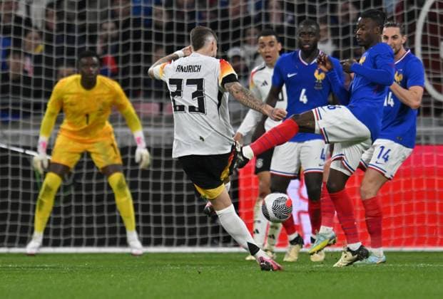 Eduardo camavinga (france) vs Robert Andrich (allemagne) FOOTBALL: France vs Allemagne - Amical - 23 03 2024 FredericChambert Panoramic 