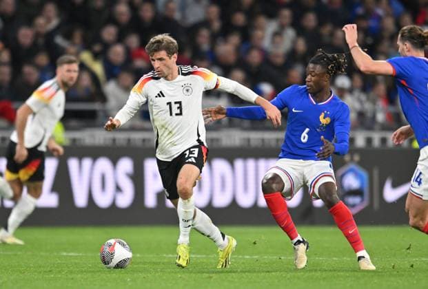 Eduardo Camavinga (france) vs Thomas Muller (allemagne) FOOTBALL: France vs Allemagne - Amical - 23 03 2024 FredericChambert Panoramic 