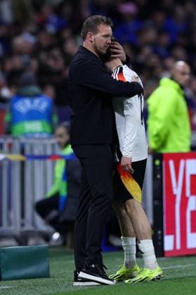 Fußball Länderspiel Frankreich - Deutschland am 23.03.2024 im Groupama Stadium in Lyon Julian Nagelsmann ( Bundestrainer Cheftrainer Deutschland ), links - Florian Wirtz ( Deutschland ), rechts DFB regulations prohibit any use of photographs as image sequences and or quasi-video.