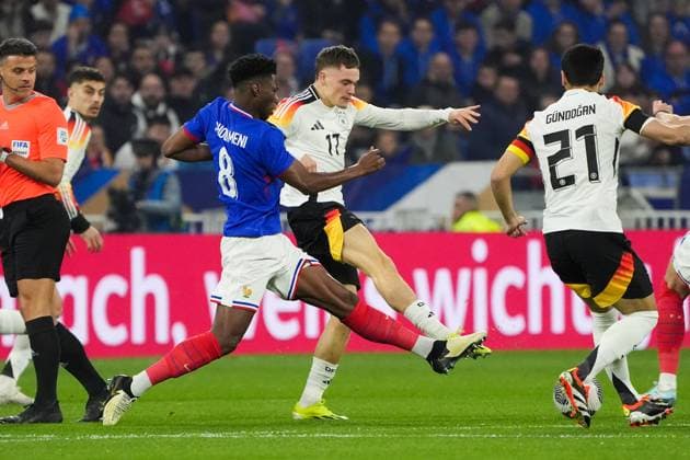 Florian Wirtz (Deutschland Germany) gegen Aurelien Tchouameni (Frankreich, France) - Lyon 23.03.2024: Frankreich vs. Deutschland, Groupama Stadium Lyon, Freundschaftspiel, Friendly