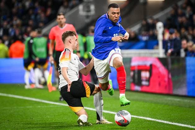 March 23, 2024, Decines-Charpieu, France, France: Joshua KIMMICH of Germany and Kylian MBAPPE of France during the International Friendly, Länderspiel, Nationalmannschaft match between France and Germany at Groupama Stadium on March 23, 2024 in Decines-Charpieu near Lyon, France. Decines-Charpieu France - ZUMAm308 20240323_zsp_m308_009 Copyright: xMatthieuxMirvillex