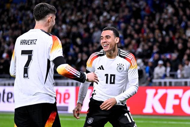 HAVERTZ Kai Team Deutschland mit MUSIALA Jamal Jubelt nach seinem Tor zum 0 : 2 Laenderspiel Frankreich - Deutschland 0 : 2 am 23. 03. 2024 in Lyon DFL REGULATIONS PROHIBIT ANY USE OF PHOTOGRAPHS as IMAGE SEQUENCES and or QUASI-VIDEO Copyright: xLacixPerenyix