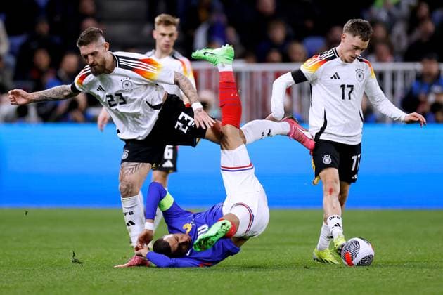 ANDRICH Robert Team Deutschland mit Kapitaen MBAPPE Kylian Laenderspiel Frankreich - Deutschland 0 : 2 am 23. 03. 2024 in Lyon DFL REGULATIONS PROHIBIT ANY USE OF PHOTOGRAPHS as IMAGE SEQUENCES and or QUASI-VIDEO Copyright: xLacixPerenyix