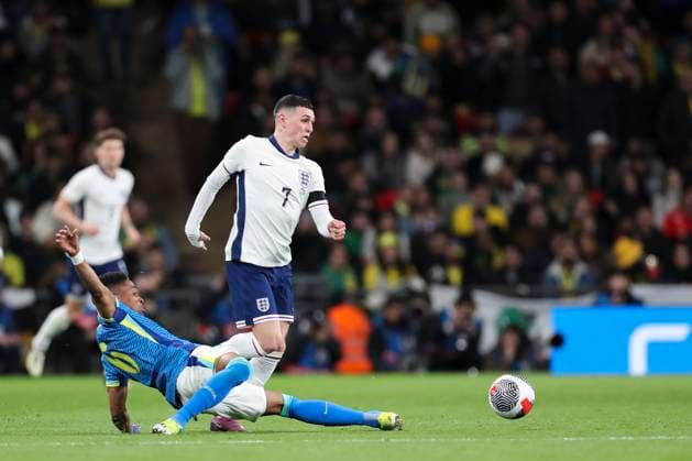 England v Brazil Wendell tackles England forward Phil Foden during the England v Brazil International Friendly, Länderspiel, Nationalmannschaft match at Wembley Stadium, London, England, United Kingdom on 23 March 2024 Editorial use only. All images are copyright Every Second Media Limited. No images may be reproduced without prior permission. Copyright: xIMAGO EveryxSecondxMediax ESM-0964-0091