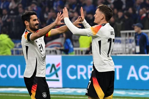 Lyon, Groupama Stadium, 23.03.24, GER, Herren, Laenderspiel, Frankreich-Deutschland Bild: Florian WIRTZ (Deutschland) jubelt nach seinem Tor zum 0:1 mit Ilkay GUENDOGAN (Deutschland) Only for editorial use! UEFA regulations prohibit any use of photographs as image sequences and or quasi-video. Auvergne-Rhone-Alpes Frankreich