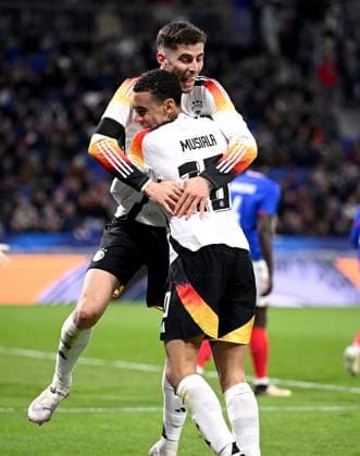 FUSSBALL INTERNATIONAL Testspiel in Lyon Frankreich - Deutschland 23.03.2023 Jubel nach dem Tor zum 0 - 2 , Torschuetze Kai Havertz (li.) mit Jamal Musiala (re, Deutschland)
