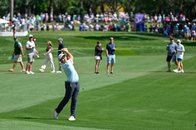 PALM HARBOR, FL - MARCH 23: Dylan Wu (USA) watches his second shot on 14 during Rd3 of the Valspar Championship at Innisbrook Resort - Copperhead, on March 23, 2024, in Palm Harbor, Florida. (Photo by Ken Murray Icon Sportswire) GOLF: MAR 23 PGA, Golf Herren Valspar Championship EDITORIAL USE ONLY Icon2403230223