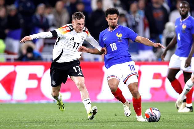 WIRTZ Florian Team Deutschland mit ZAIRE EMERY Laenderspiel Frankreich - Deutschland 0 : 2 am 23. 03. 2024 in Lyon DFL REGULATIONS PROHIBIT ANY USE OF PHOTOGRAPHS as IMAGE SEQUENCES and or QUASI-VIDEO Copyright: xLacixPerenyix