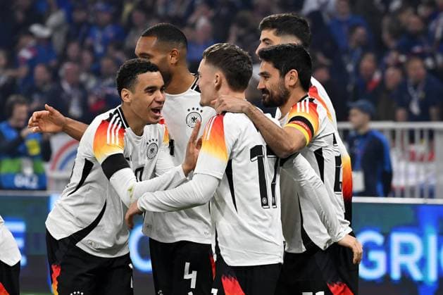 Lyon, Groupama Stadium, 23.03.24, GER, Herren, Laenderspiel, Frankreich-Deutschland Bild: Florian WIRTZ (Deutschland) jubelt nach seinem Tor zum 0:1 mit Jamal MUSIALA (Deutschland) Only for editorial use! UEFA regulations prohibit any use of photographs as image sequences and or quasi-video. Auvergne-Rhone-Alpes Frankreich