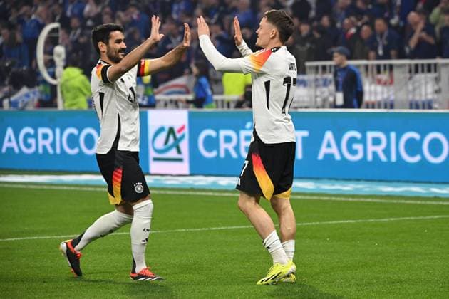 Lyon, Groupama Stadium, 23.03.24, GER, Herren, Laenderspiel, Frankreich-Deutschland Bild: Florian WIRTZ (Deutschland) jubelt nach seinem Tor zum 0:1 mit Ilkay GUENDOGAN (Deutschland) Only for editorial use! UEFA regulations prohibit any use of photographs as image sequences and or quasi-video. Auvergne-Rhone-Alpes Frankreich