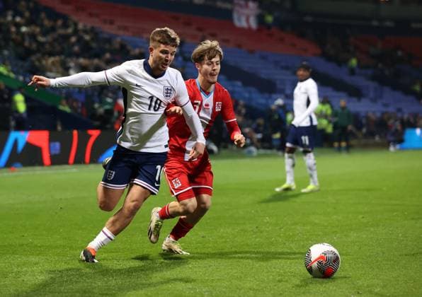26th March 2024; Toughsheet Community Stadium, Bolton, Greater Manchester, England; UEFA U21, U 21 EURO Qualifier, EM, Europameisterschaft England U21 versus Luxembourg U21; James McAtee of England takes on F Lohei of Luxembourg  ActionPlus12621807 DavidxBlunsden