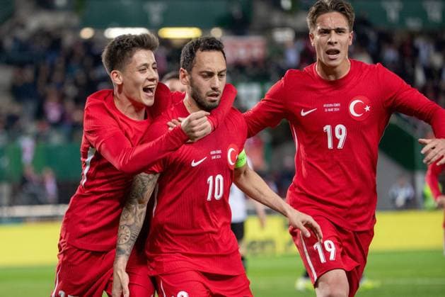 SOCCER - AUT vs TUR, test match VIENNA,AUSTRIA,26.MAR.24 - SOCCER - OEFB International Friendly, Länderspiel, Nationalmannschaft match, Austria vs Turkey. Image shows the rejoicing of Arda Gueler, Hakan Calhanoglu and Kenan Yildiz (TUR).  GEPAxpictures xPhilippxBrem