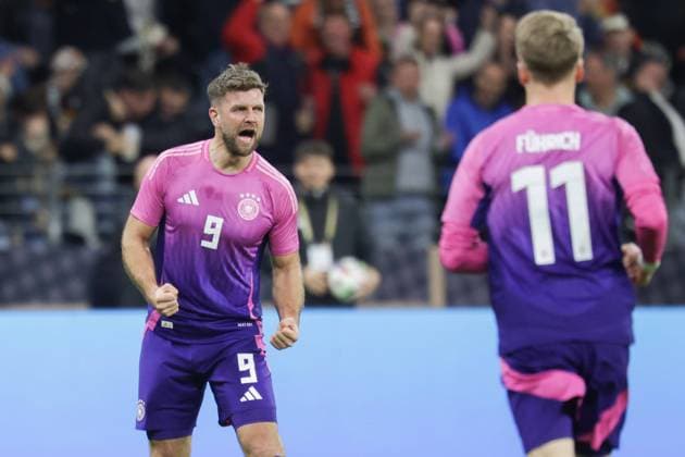 Deutschland - Niederlande, Testspiel Niclas Füllkrug (Deutschland, 9) jubelt nach seinem Tor zum 2:1. Rechts Chris Führich (Deutschland, 11). Fußball-Länderspiel zwischen Deutschland und der Niederlande am 26. März 2024 im Deutsche Bank Park in Frankfurt am Main., Frankfurt am Main Hessen Deutschland Deutsche Bank Park
