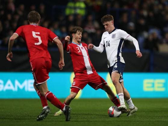 26th March 2024; Toughsheet Community Stadium, Bolton, Greater Manchester, England; UEFA U21, U 21 EURO Qualifier, EM, Europameisterschaft England U21 versus Luxembourg U21; Alex Scott of England is tackled by Fabio Lohei of Luxembourg  ActionPlus12622275 DavidxBlunsden